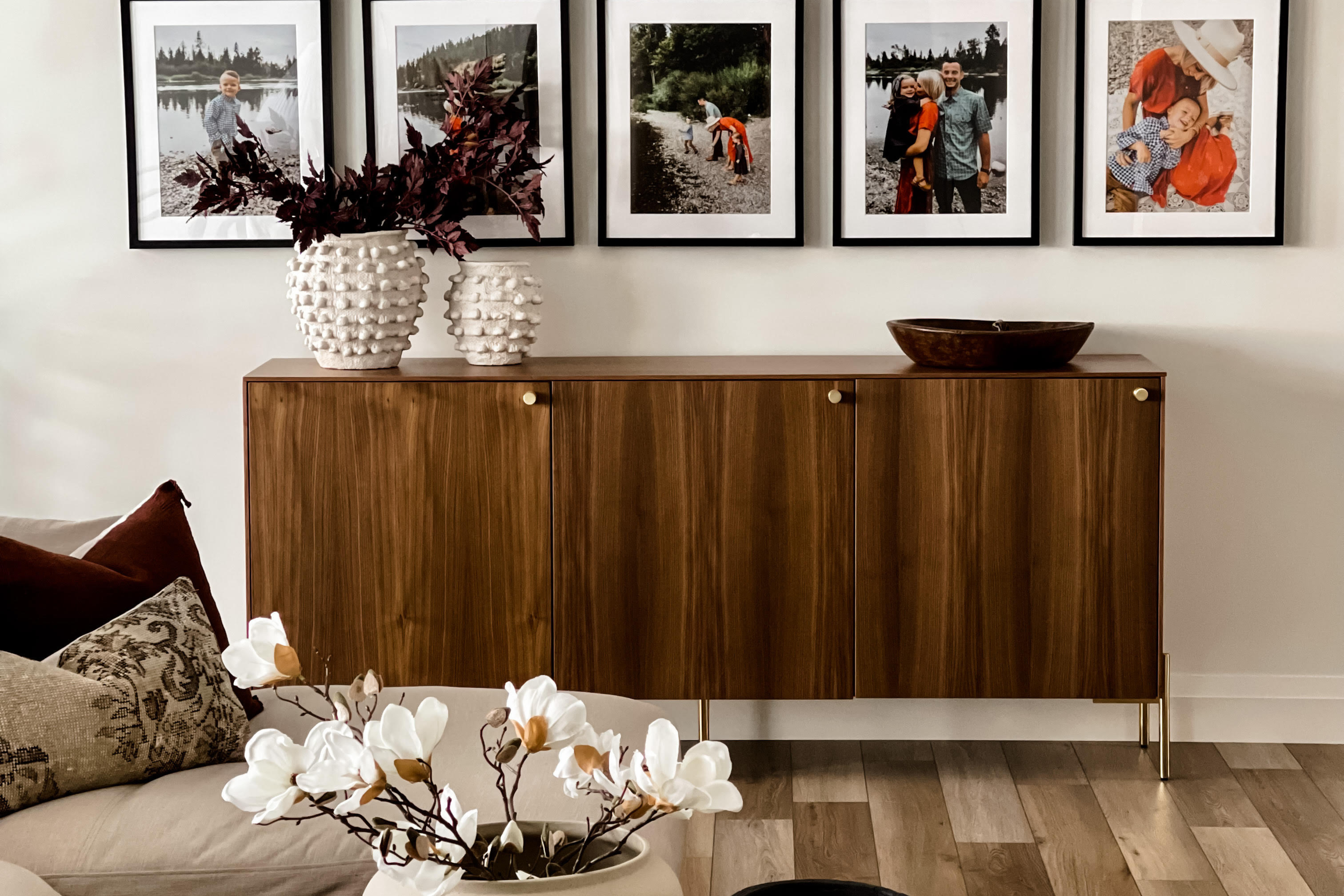 Walnut triple doors with brass accessories from Norse Interiors on an IKEA Besta frame