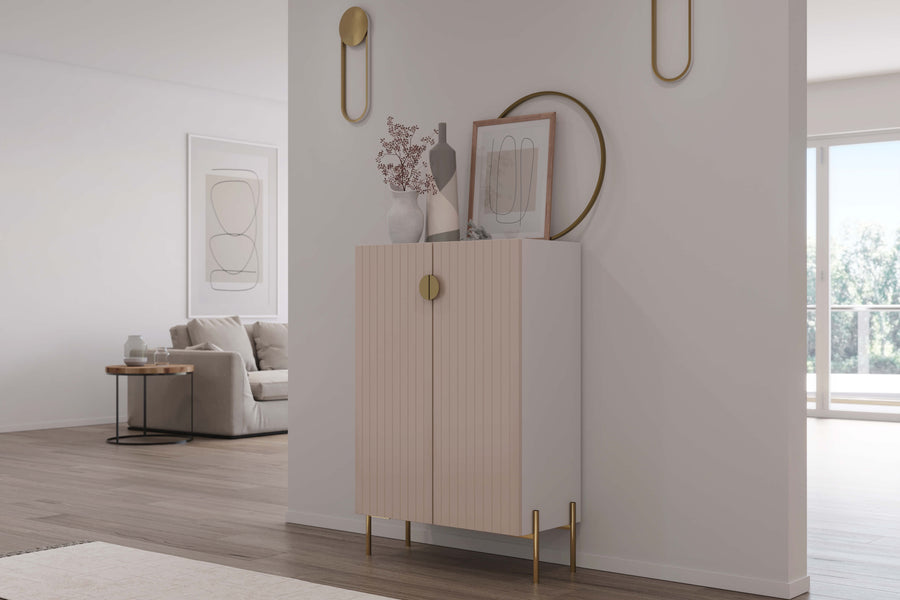 Astrid doors in pale blush on a Sektion frame with brass accessories from Norse Interiors