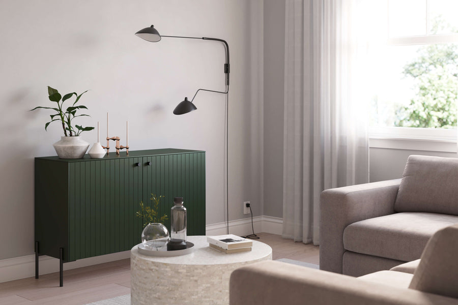 Astrid doors in luxe green with black hardware from Norse Interiors on an IKEA double Besta frame 