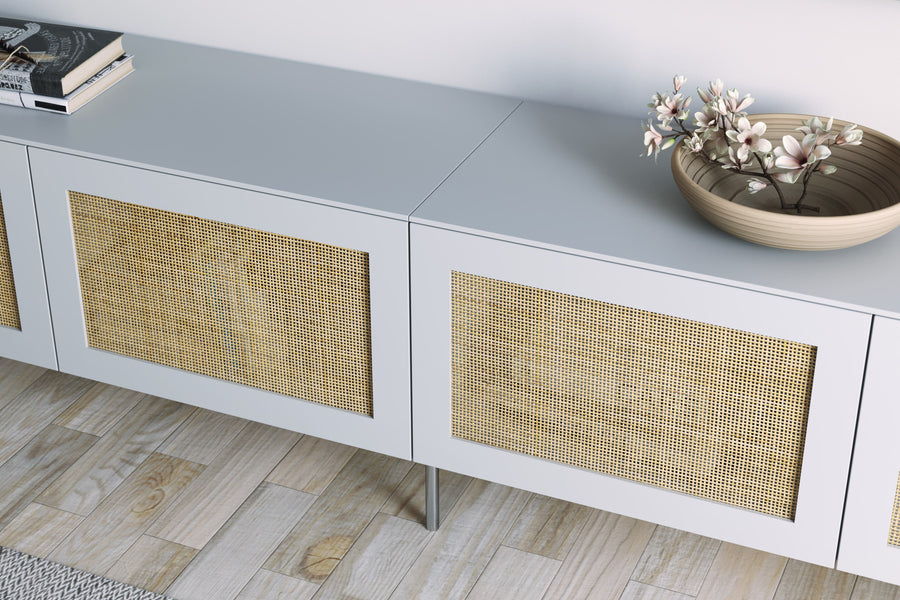 Gray sideboard using IKEA Besta and Norse cane doors and panels