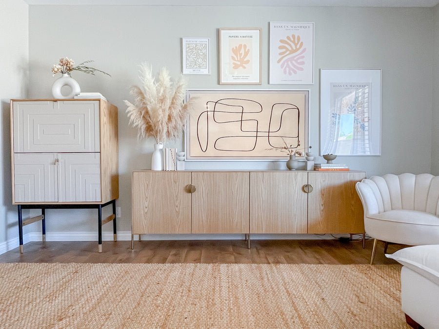 White oak doors and panels, Sara and Ilse brass legs, and Cornelia brass pulls from Norse Interiors on a triple Besta frame